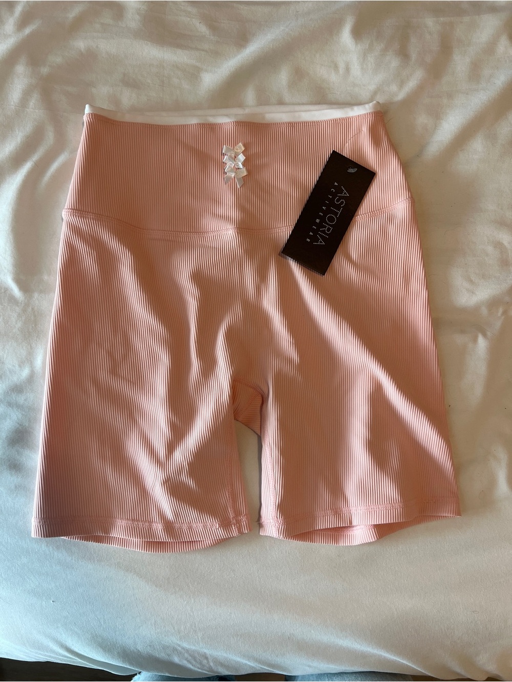 NWT Astoria Soft Pink and White Active shorts with Bows. Size Large